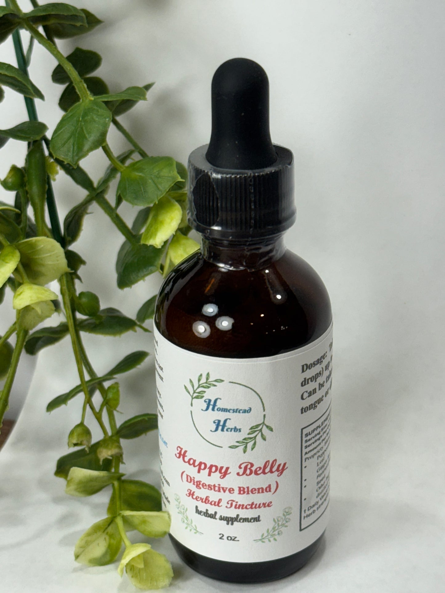 Happy Belly herbal tincture with peppermint, ginger, and fennel – crafted to support healthy digestion and gut comfort